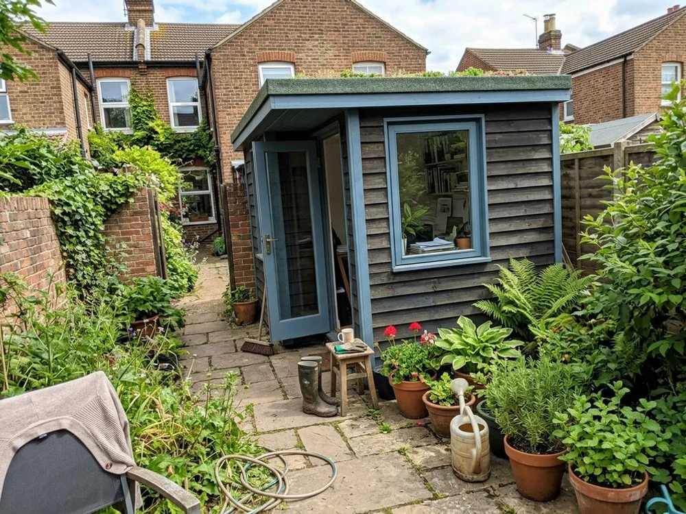 Compact garden office in a terraced garden in Leighton Buzzard